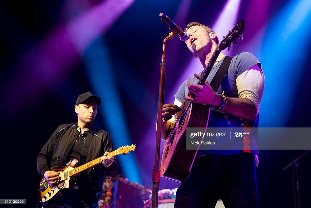 passport-to-brits-week-jonny-buckland-and-chris-martin-of-coldplay-picture-id512130556