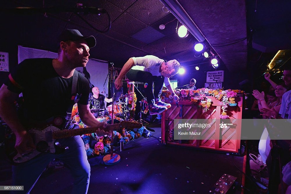 jonny-buckland-and-chris-martin-of-coldplay-perform-for-siriusxm-in-picture-id587151000