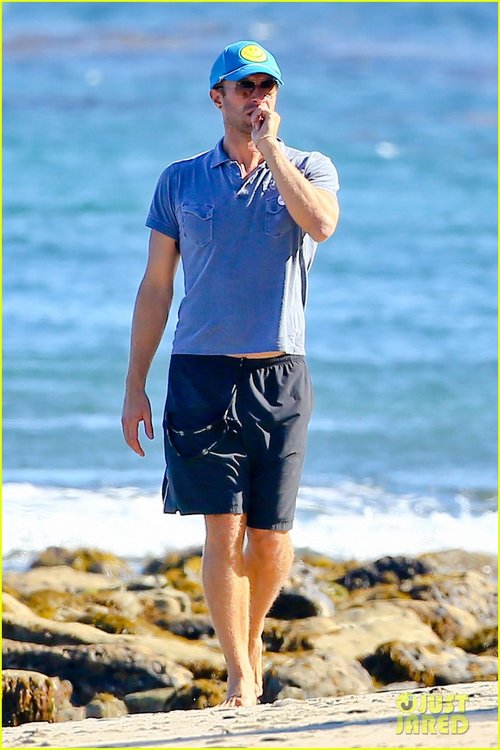 chris-martin-smiley-face-beach-03.jpg