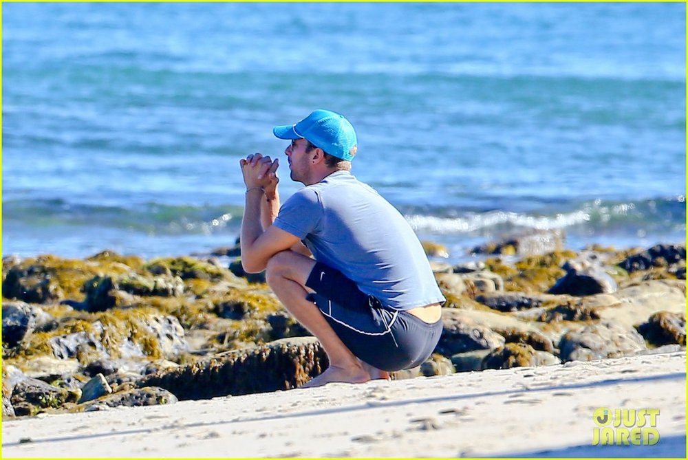 chris-martin-smiley-face-beach-18.jpg