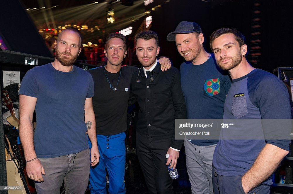 singer-sam-smith-poses-with-musicians-will-champion-chris-martin-picture-id492046522